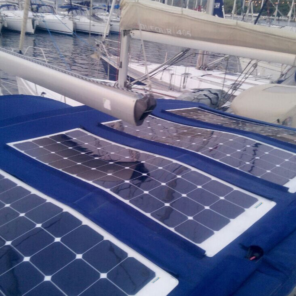 Three ACOPOWER flexible solar panels mounted on a sailboat deck