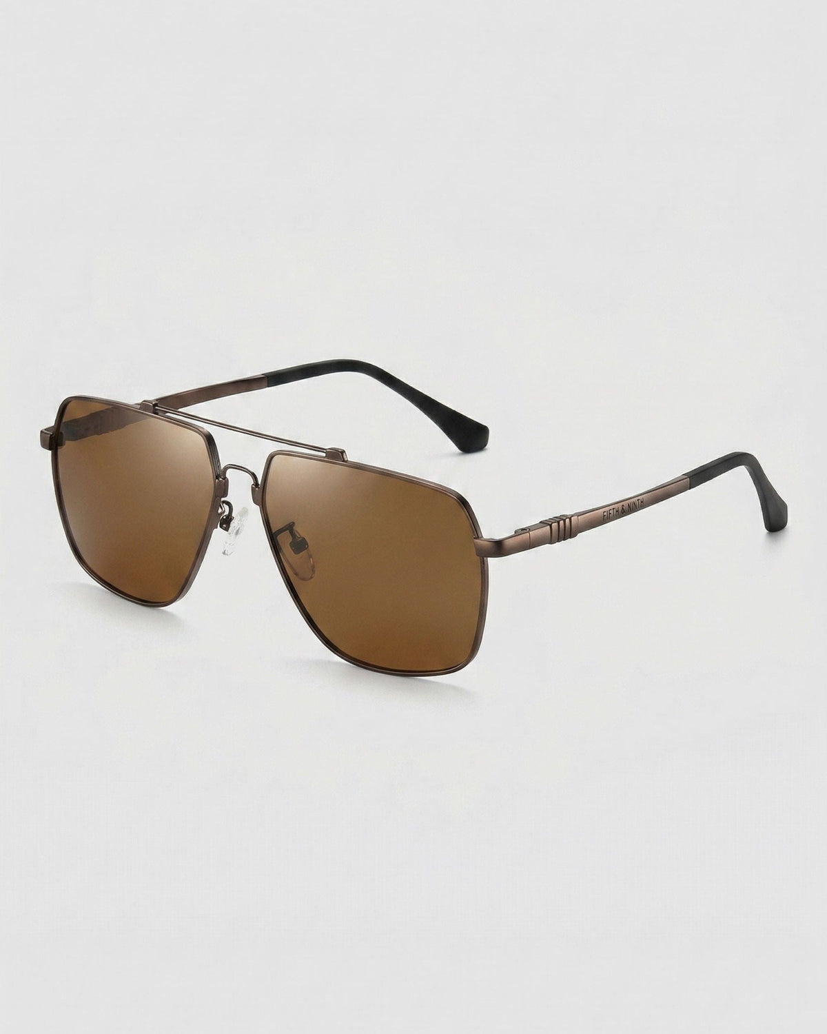 Fifth & Ninth East polarized aviator sunglasses with a bronze frame and brown lenses, angled side view