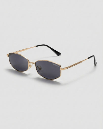 Fifth & Ninth Rowan polarized sunglasses with a gold geometric frame and dark lenses, angled side view