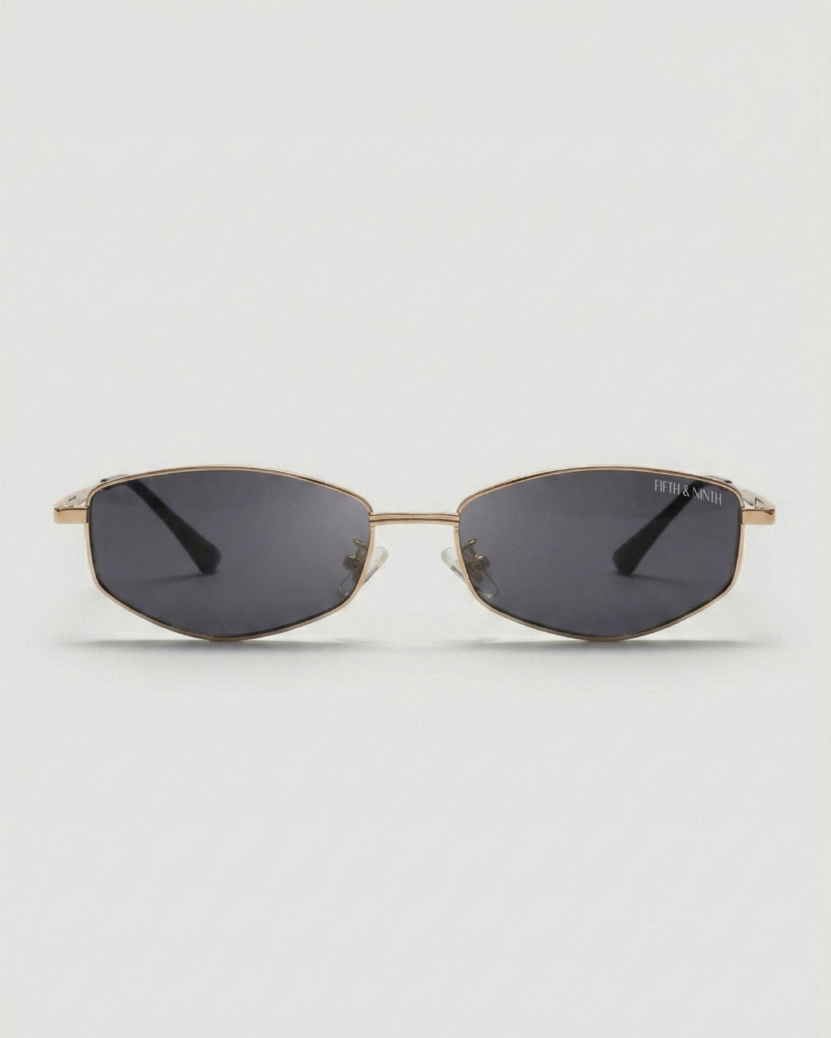 Fifth & Ninth Rowan polarized sunglasses with a gold geometric frame and dark lenses, front view