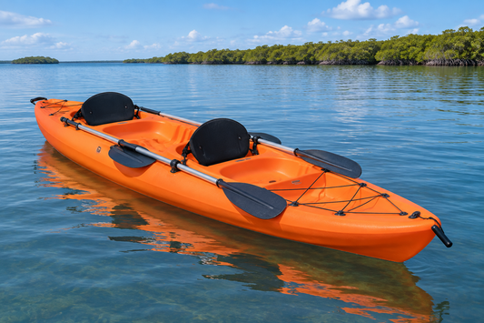 Tandem kayak floating beside an open mangrove bay